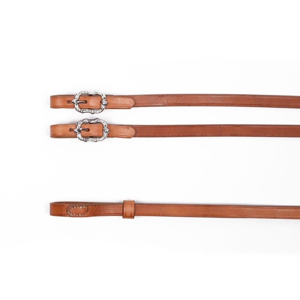 Baroque reins made of natural coloured leather with silver Cortesia buckles at Picadera